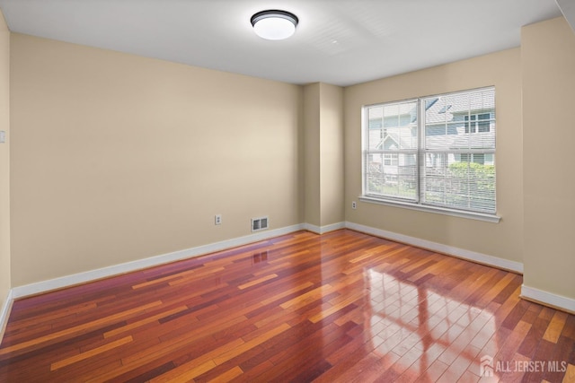 204 Concord Pl, North Brunswick, NJ 08902 - spare room with hardwood / wood-style flooring and baseboards