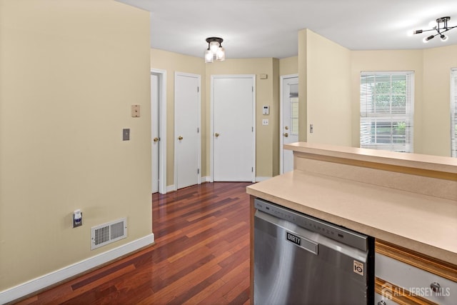 204 Concord Pl, North Brunswick, NJ 08902 - kitchen with stainless steel dishwasher, dark wood-style floors, and light countertops