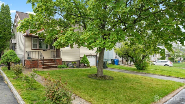 149 Ethel St, Menlo Park Terrace, NJ 08840 - view of property hidden behind natural elements with driveway, a front lawn, and a garage