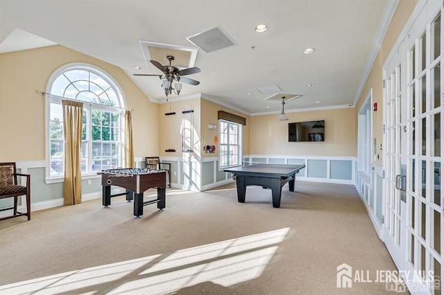 rec room featuring carpet flooring, a ceiling fan, recessed lighting, visible vents, and ornamental molding
