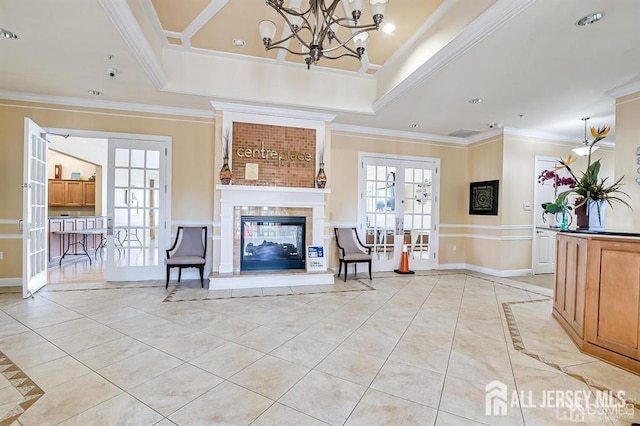 living room featuring crown molding, a raised ceiling, and light tile patterned floors