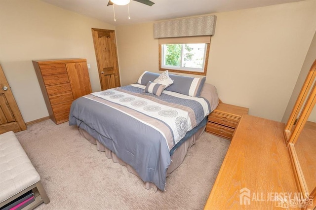 bedroom featuring carpet flooring and a ceiling fan