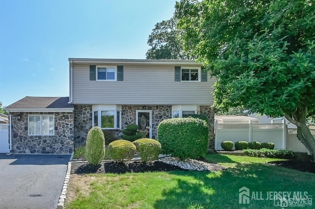 view of front of home featuring stone siding