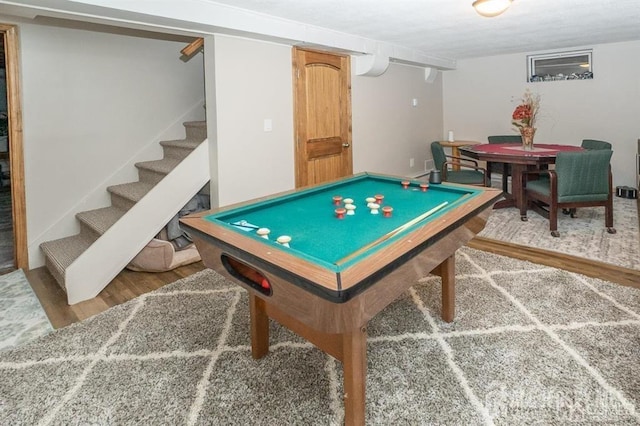recreation room with wood finished floors and pool table