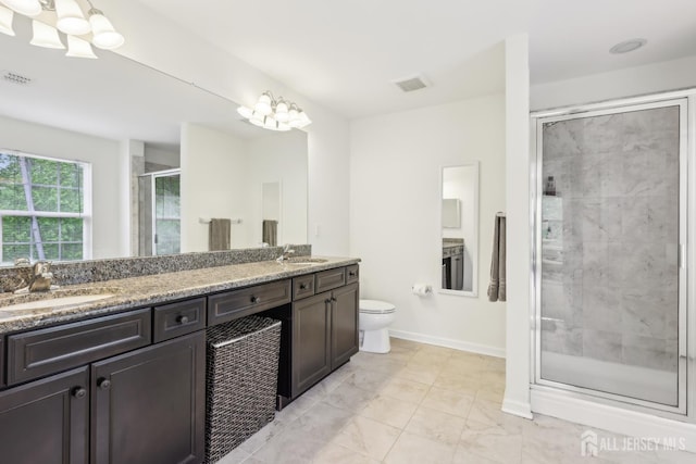 106 Ellsworth Way S, Brunswick, NJ 08852 - full bathroom featuring a chandelier, a stall shower, double vanity, toilet, and baseboards