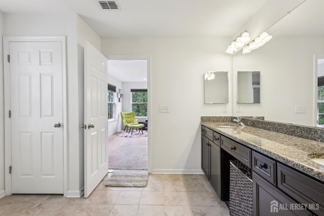 106 Ellsworth Way S, Brunswick, NJ 08852 - full bathroom featuring double vanity, baseboards, and tile patterned flooring