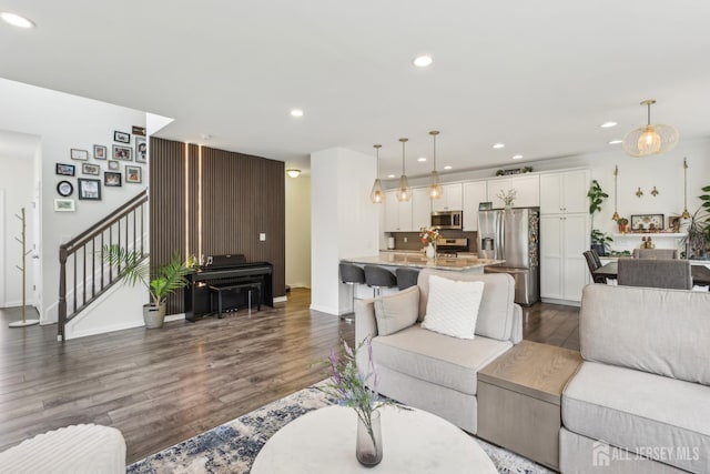 106 Ellsworth Way S, Brunswick, NJ 08852 - living area featuring dark wood finished floors, stairs, recessed lighting, and baseboards