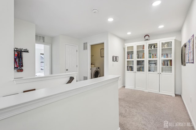106 Ellsworth Way S, Brunswick, NJ 08852 - hallway featuring recessed lighting, light carpet, baseboards, and washing machine and dryer