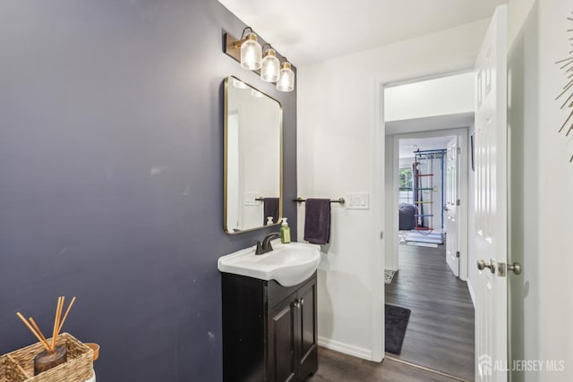 106 Ellsworth Way S, Brunswick, NJ 08852 - bathroom with baseboards, wood finished floors, and vanity