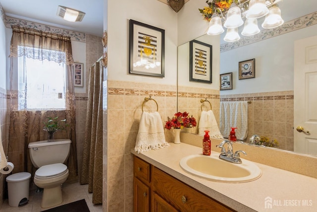99 William St, South River, NJ 08882 - bathroom featuring tile walls, vanity, a chandelier, tile patterned floors, and wainscoting
