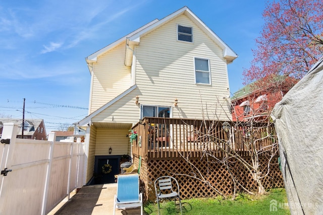 99 William St, South River, NJ 08882 - rear view of property with a wooden deck