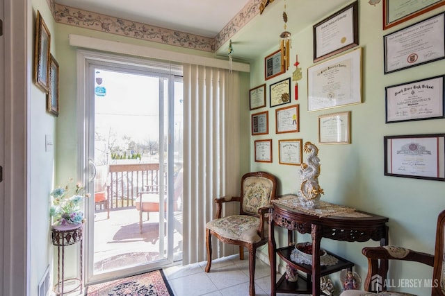99 William St, South River, NJ 08882 - living area with healthy amount of natural light and light tile patterned flooring