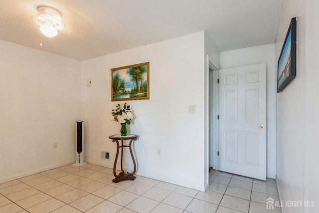 99 William St, South River, NJ 08882 - empty room with light tile patterned flooring and baseboards