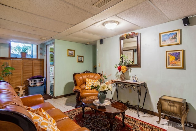 99 William St, South River, NJ 08882 - living area featuring a drop ceiling and tile patterned floors
