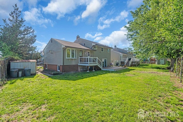 73 Webb Dr, Fords, NJ 08863 - back of property featuring a storage shed and a wooden deck