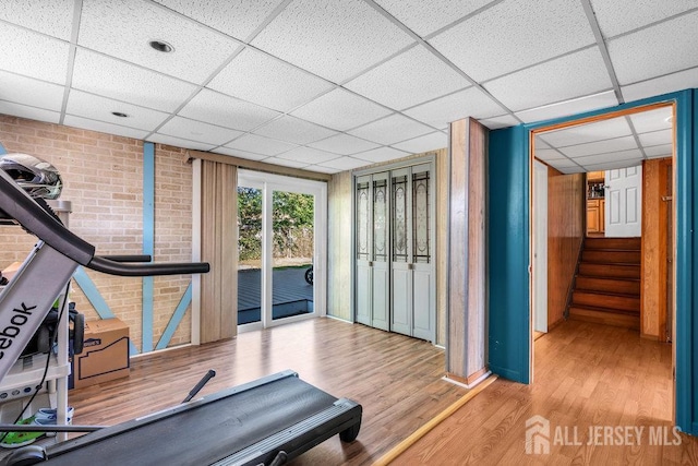 73 Webb Dr, Fords, NJ 08863 - exercise room featuring a paneled ceiling and wood finished floors