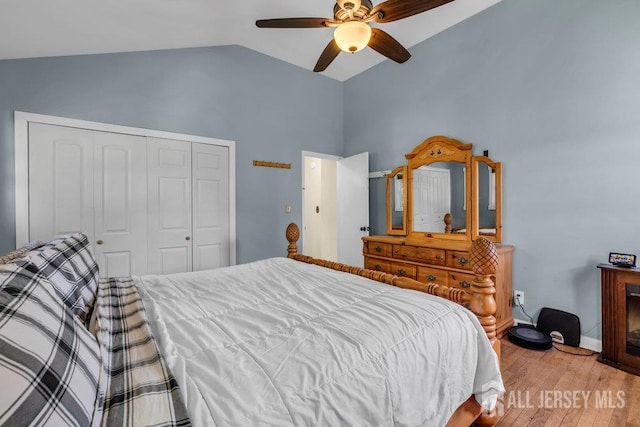 73 Webb Dr, Fords, NJ 08863 - bedroom featuring a closet, light wood-style flooring, high vaulted ceiling, and ceiling fan