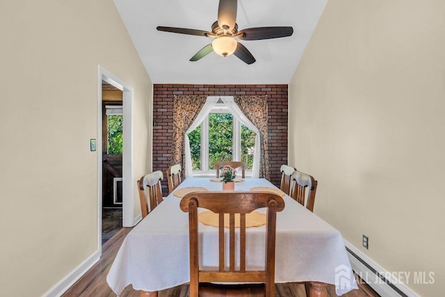 73 Webb Dr, Fords, NJ 08863 - dining room featuring a baseboard heating unit, wood finished floors, and ceiling fan