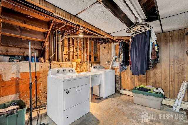 73 Webb Dr, Fords, NJ 08863 - unfinished below grade area with washer and clothes dryer and wooden walls