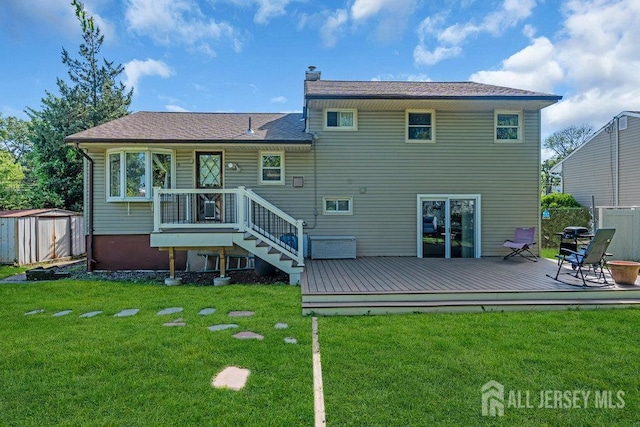 73 Webb Dr, Fords, NJ 08863 - back of house with a storage unit, a deck, and a chimney