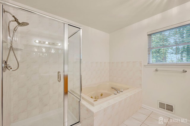 10 Rauer Ct, South Plainfield, NJ 07080 - full bath with a shower stall, a jetted tub, and tile patterned floors