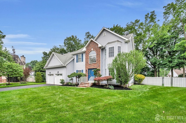 10 Rauer Ct, South Plainfield, NJ 07080 - view of front of property with driveway and a garage