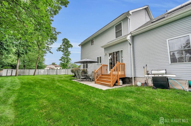 10 Rauer Ct, South Plainfield, NJ 07080 - back of house with a shed and a patio area