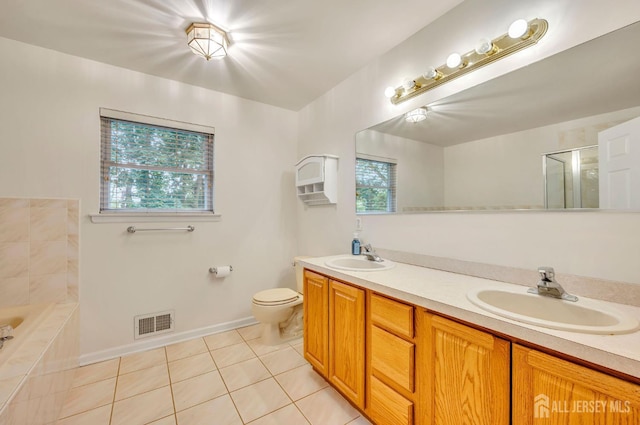 10 Rauer Ct, South Plainfield, NJ 07080 - full bath with tile patterned flooring, double vanity, a garden tub, and a shower with shower door