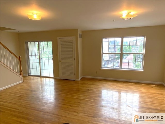 76 Union St Unit A10, Newark, NJ 07105 - entryway with healthy amount of natural light, stairway, and wood finished floors