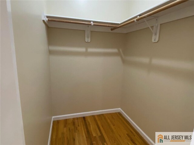 76 Union St Unit A10, Newark, NJ 07105 - walk in closet featuring wood finished floors