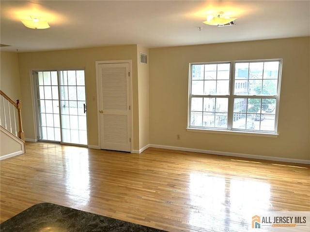 76 Union St Unit A10, Newark, NJ 07105 - unfurnished living room featuring stairway and wood finished floors