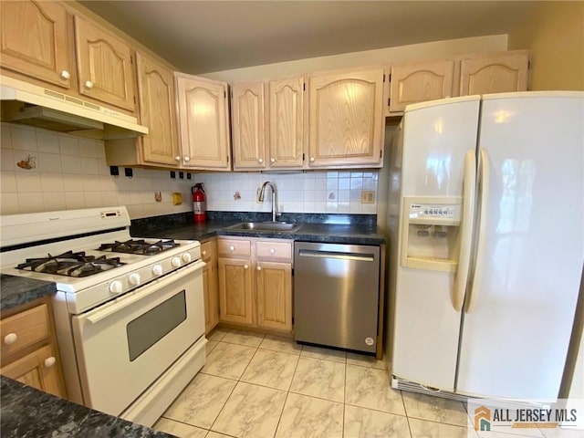 76 Union St Unit A10, Newark, NJ 07105 - kitchen with white appliances, under cabinet range hood, tasteful backsplash, and light brown cabinetry