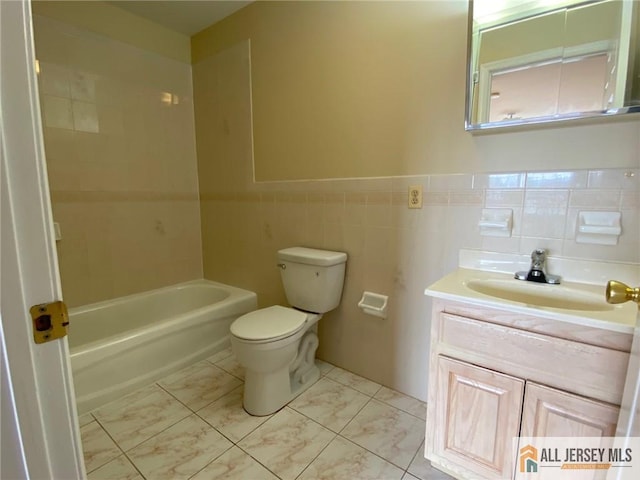 76 Union St Unit A10, Newark, NJ 07105 - bathroom with vanity, tile walls, and shower / bath combination