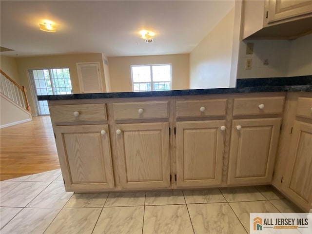 76 Union St Unit A10, Newark, NJ 07105 - kitchen with plenty of natural light and dark countertops