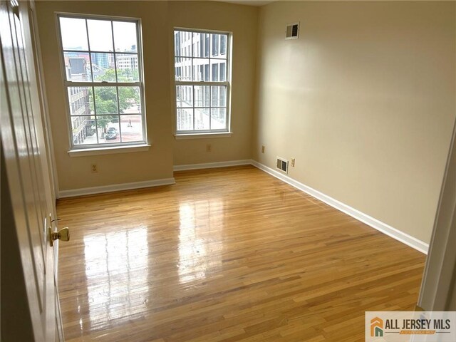 76 Union St Unit A10, Newark, NJ 07105 - unfurnished room with baseboards and light wood finished floors