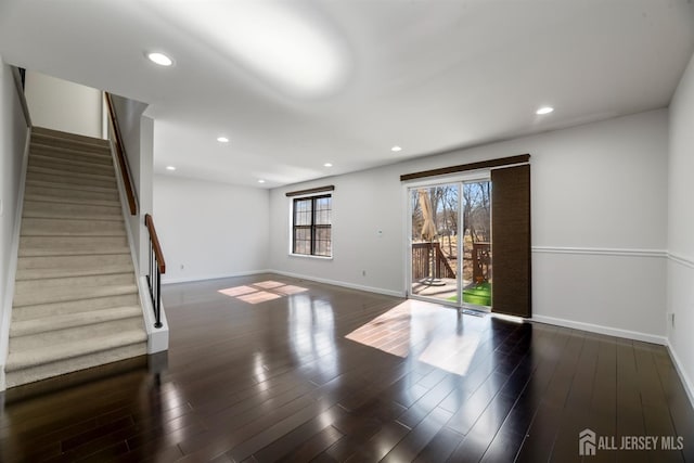 interior space featuring stairway, recessed lighting, baseboards, and wood finished floors