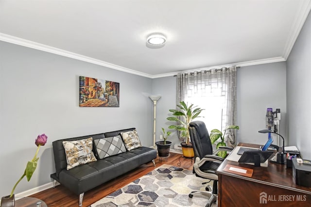 office area with hardwood / wood-style floors and crown molding