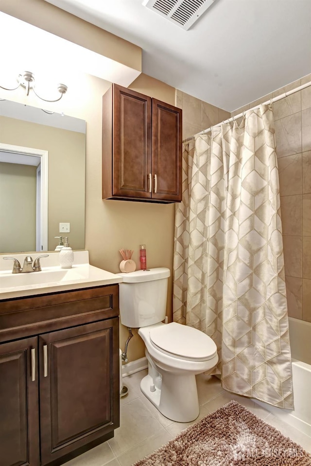 full bathroom with tile patterned flooring, vanity, toilet, and shower / bath combo