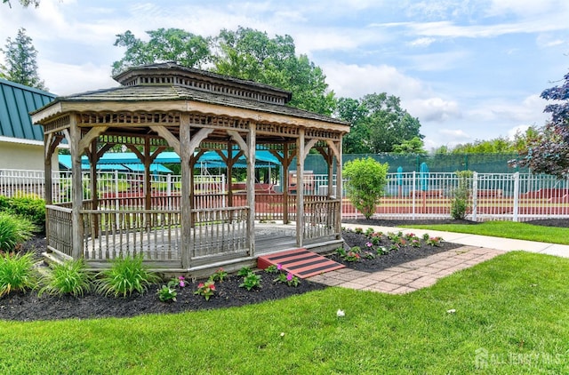 view of community featuring a gazebo and a lawn