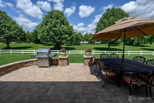 15 Heather Ct, Mansfield, NJ 08022 - fenced backyard with grilling area, a patio area, and outdoor dining area