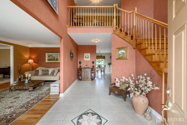 15 Heather Ct, Mansfield, NJ 08022 - tiled entrance foyer with a high ceiling, baseboards, and stairs