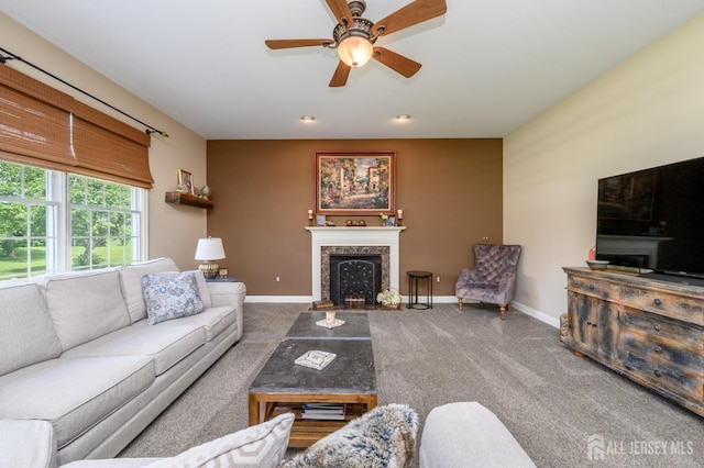 15 Heather Ct, Mansfield, NJ 08022 - carpeted living area with a fireplace with flush hearth, a ceiling fan, and baseboards