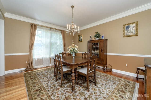15 Heather Ct, Mansfield, NJ 08022 - dining room featuring a chandelier, ornamental molding, baseboards, and light wood-style flooring