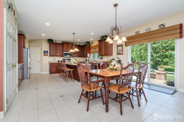 15 Heather Ct, Mansfield, NJ 08022 - dining area with a chandelier, light tile patterned floors, recessed lighting, and baseboards