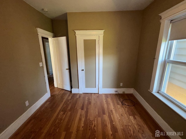 134 S Stevens Ave S, South Amboy, NJ 08879 - unfurnished bedroom featuring wood finished floors and baseboards