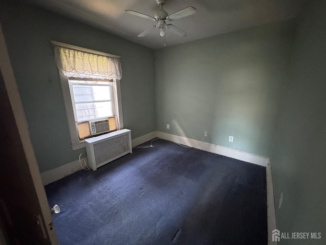 134 S Stevens Ave S, South Amboy, NJ 08879 - spare room featuring cooling unit, baseboards, ceiling fan, and dark carpet