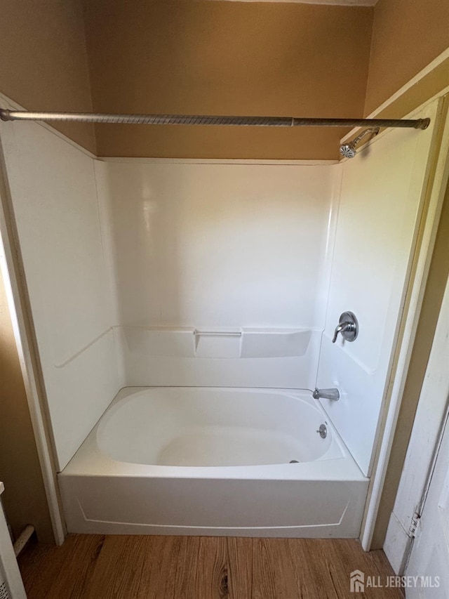134 S Stevens Ave S, South Amboy, NJ 08879 - bathroom featuring wood finished floors and  shower combination