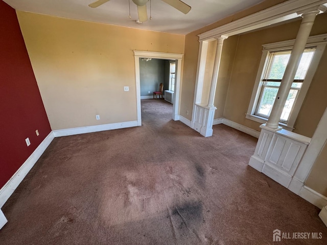134 S Stevens Ave S, South Amboy, NJ 08879 - empty room featuring ornate columns, ceiling fan, carpet, and baseboards