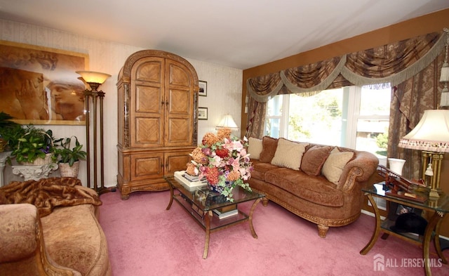 living room featuring wallpapered walls and carpet flooring