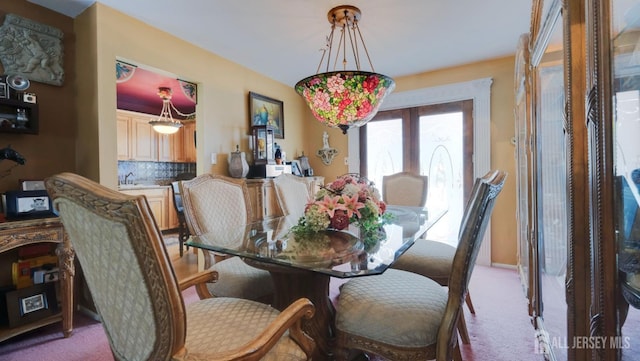 view of carpeted dining room